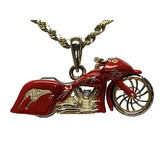 14k YG motorcycle pendant with red enamel and a diamond breather