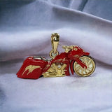 14k YG motorcycle pendant with red enamel and a diamond breather
