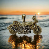 14k YG sporty motorcycle with accent pieces rhodium coated for a chrome look